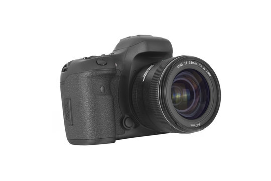 A lens mounted on a camera body, side view.